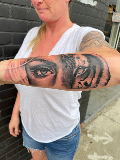 Explore hawk tattoo ideas, creative tattoo ideas in South Boston, available at Seaport Tattoo Company