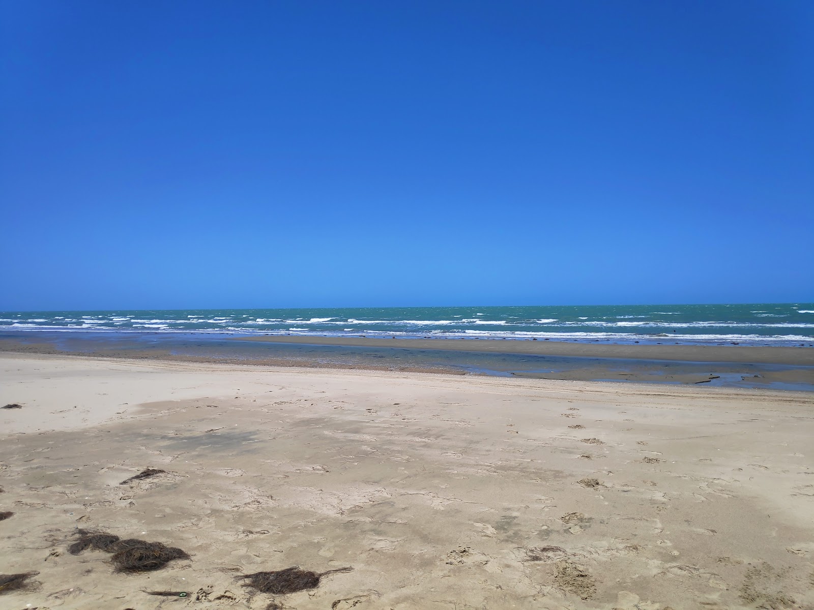 Foto di Spiaggia di Gado Bravo con una superficie del sabbia beige