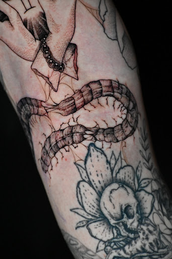 Explore elbow tattoo ideas men, creative tattoo ideas in Clarksville, available at Dark Raine Tattoo