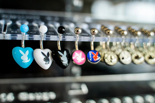 Explore family tattoo ideas for guys on arm, creative tattoo ideas in North Charleston, available at Exotic Impressions Body Piercing