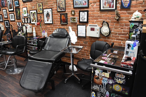 Explore lower belly tattoo ideas, creative tattoo ideas in Dubuque, available at The Crows Nest