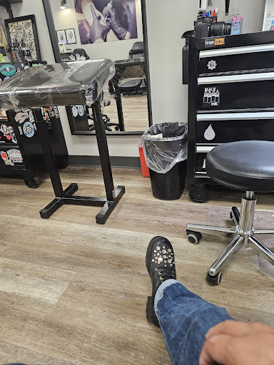 Explore alpha omega tattoo ideas, creative tattoo ideas in Ocoee, available at Fine Ink Studios Tattoos