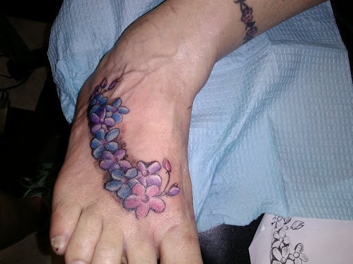 Explore tattoo ideas initials, creative tattoo ideas in Arcade, available at 98 South Tattoo and Piercing