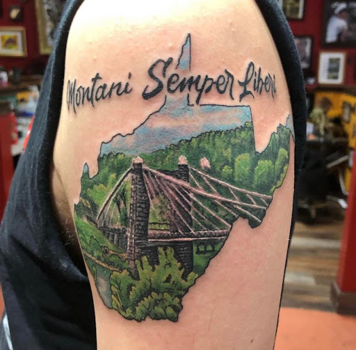 Find sagittarius tattoo ideas for your next unique tattoo in Martinsburg at 100 Proof Tattoo
