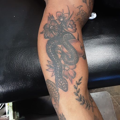 Explore cross cover up tattoo ideas, creative tattoo ideas in Baton Rouge, available at Body Ink Tattoos