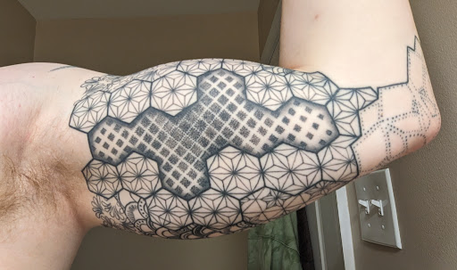 Explore disco elysium tattoo ideas, creative tattoo ideas in Waterbury Center, available at Black Garden Tattoo