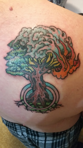 Find simple tree tattoo ideas for your next unique tattoo in Omaha at Sailors Grave Tattoo