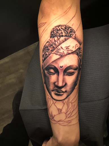 Explore feminine back tattoo ideas, creative tattoo ideas in Atlanta, available at Iron Palm Tattoos & Body Piercing Atlanta