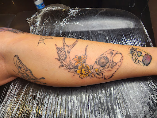 Explore rose thigh tattoo ideas, creative tattoo ideas in Tucson, available at Sublime Tattoo