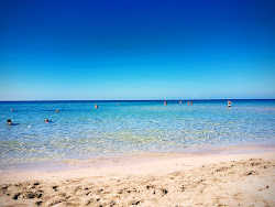Photo de Spiaggia del Villaggio Greco avec rivage droit, long