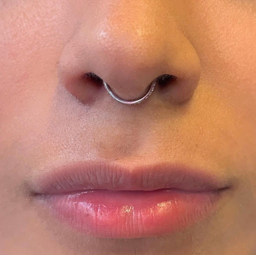 Find middle boob tattoo ideas for your next unique tattoo in Miami Beach at Tattoos by Lou Miami - South Beach