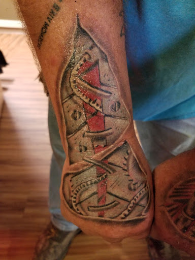 Explore family quote tattoo ideas, creative tattoo ideas in Monroe, available at Vivid Art Tattoos