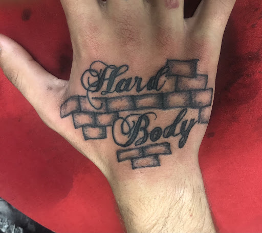 Explore bite me tattoo ideas, creative tattoo ideas in Stafford, available at Tattooz By King