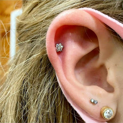 Explore lower abdominal tattoo ideas, creative tattoo ideas in North Charleston, available at Exotic Impressions Body Piercing