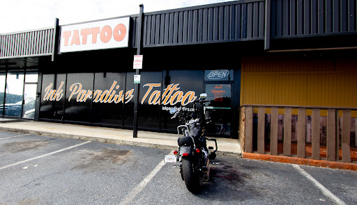 Find addams family tattoo ideas for your next unique tattoo in Marietta at Ink Paradise Tattoo