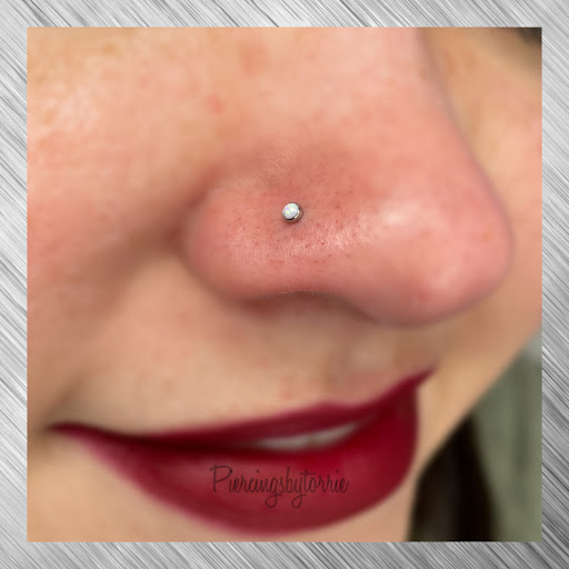 Find between the breast tattoo ideas for your next unique tattoo in Fort Walton Beach at Piercings by Torrie