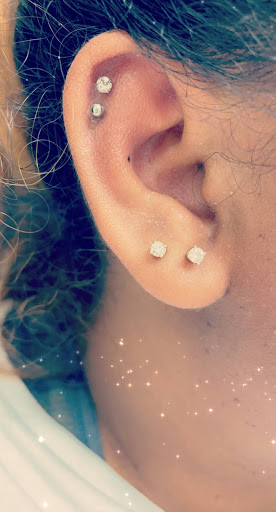 Find inbetween boob tattoo ideas for your next unique tattoo in Sacramento at Poke A Dotz Tattoos and Piercings