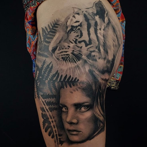 Explore tangled tattoo ideas, creative tattoo ideas in Hollywood, available at Sacred Eye Tattoos