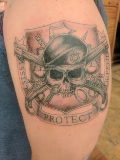 Explore cover up tattoo ideas for upper back, creative tattoo ideas in Raleigh, available at Mad Ethels Tattoo & Body Piercing