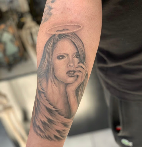 Explore medium tattoo ideas for men, creative tattoo ideas in Bronx, available at Anarchy Tattoo Studios