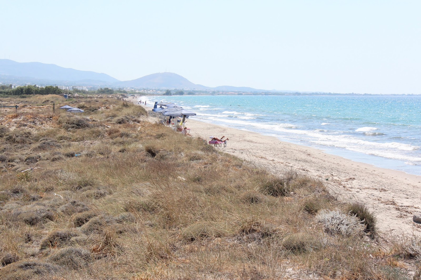 Blue lagoon beach'in fotoğrafı turkuaz saf su yüzey ile