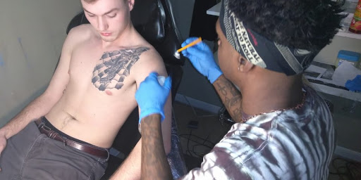 Explore wolf pack tattoo ideas, creative tattoo ideas in Atlanta, available at Iron Palm Tattoos & Body Piercing Atlanta