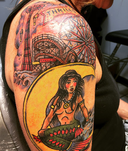 Explore santa muerte tattoo ideas, creative tattoo ideas in Neptune, available at Neptune Tattooville