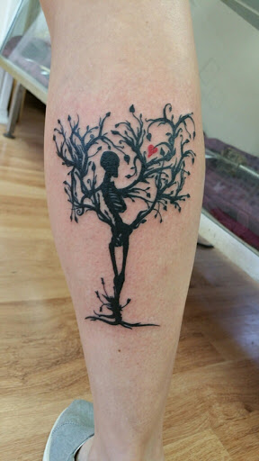 Explore open book tattoo ideas, creative tattoo ideas in Muncie, available at The Tattoo Studio