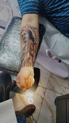 Explore back tattoo ideas men, creative tattoo ideas in El Paso, available at 3 Tattoo