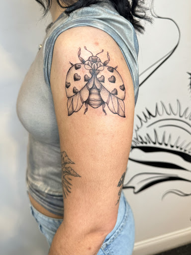 Explore small ear tattoo ideas, creative tattoo ideas in Savannah, available at Riverside Tattoo Parlor