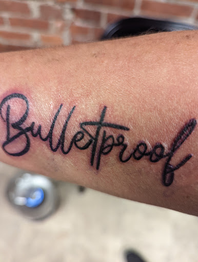 Explore barber pole tattoo ideas, creative tattoo ideas in Shelbyville, available at Redline Studio Custom Tattoo