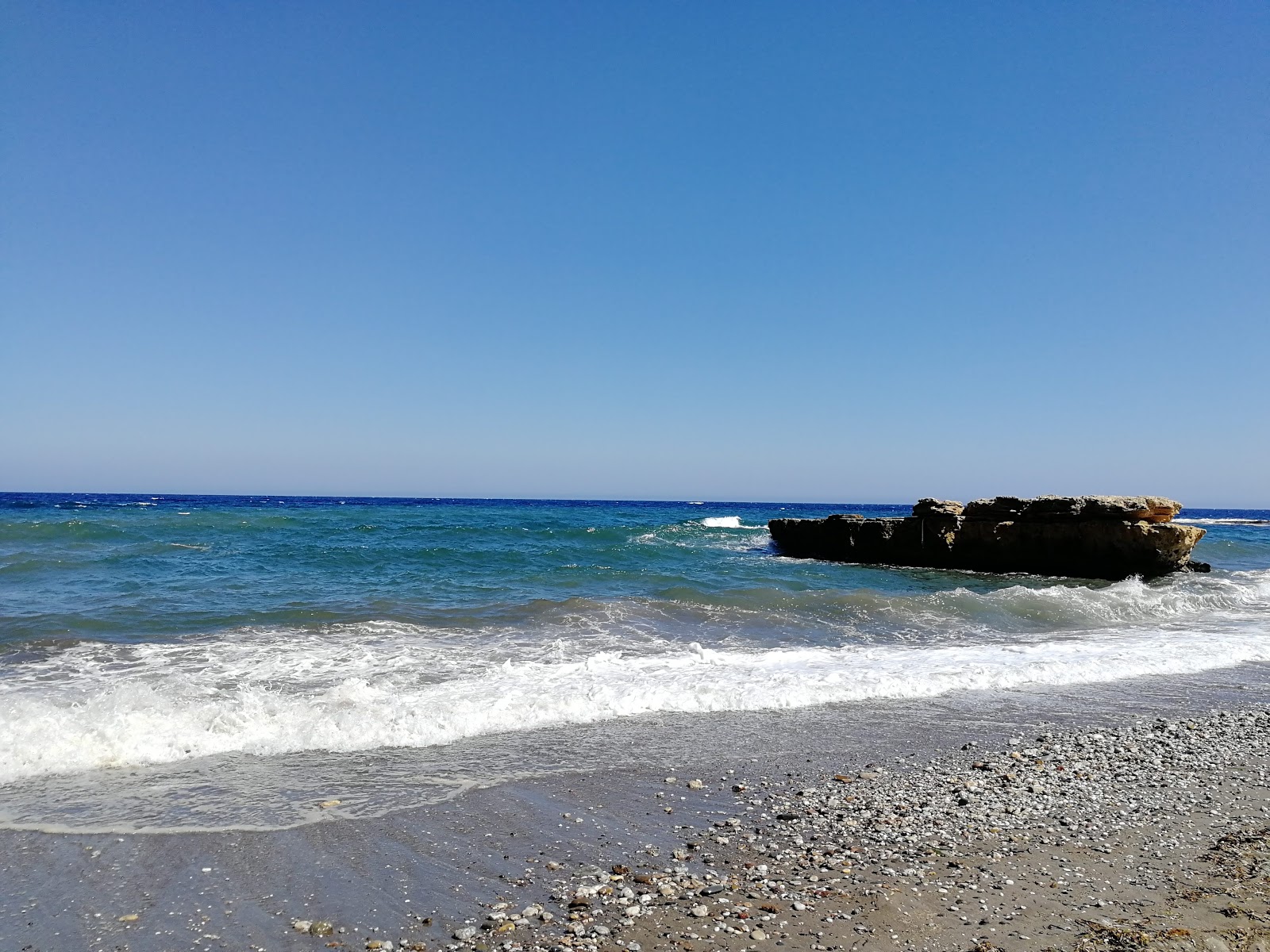 Foto di Playa de la Galera con una superficie del sabbia grigia