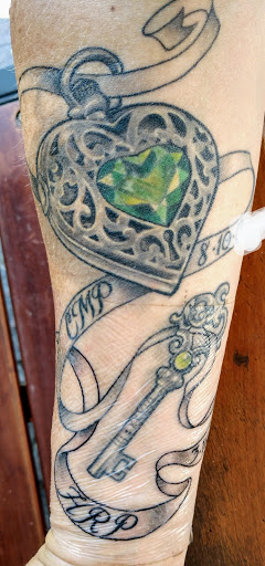 Explore half sleeve tattoo cover up ideas, creative tattoo ideas in Omaha, available at Black Squirrel Omaha