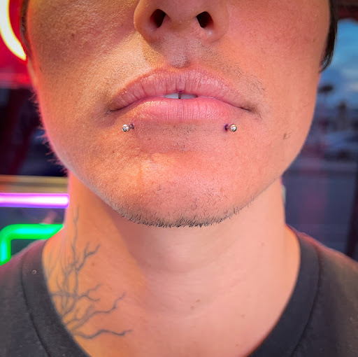 Find face tattoo idea for your next unique tattoo in Terre Haute at Piercings by Brett Rice - godpiercethequeen