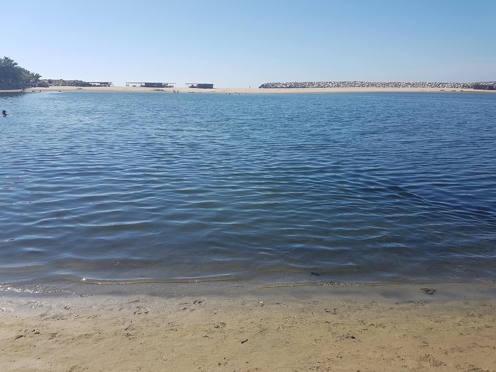 Foto di Playa Banco de Oro con una superficie del acqua turchese