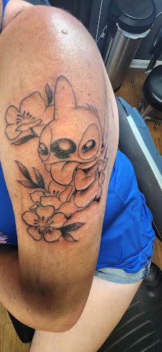 Explore good neck tattoo ideas, creative tattoo ideas in Valdosta, available at PATRIOT TATTOOER