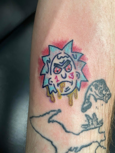 Explore small alien tattoo ideas, creative tattoo ideas in Foley, available at Symbolic Ink Tattoo Studio