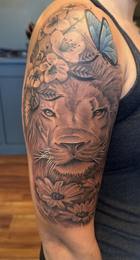 Explore cover up hand tattoo ideas, creative tattoo ideas in Garden City, available at Branded Bear Tattoo