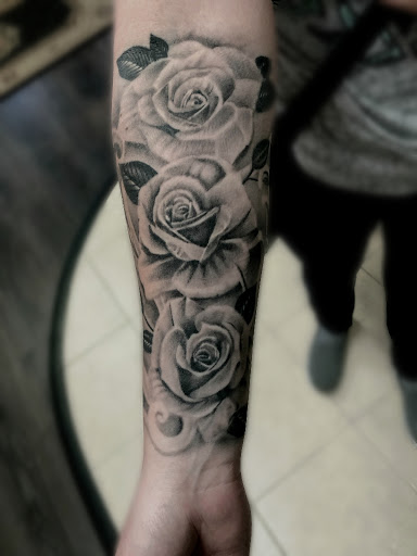 Explore great dane tattoo ideas, creative tattoo ideas in Monroe, available at Vivid Art Tattoos