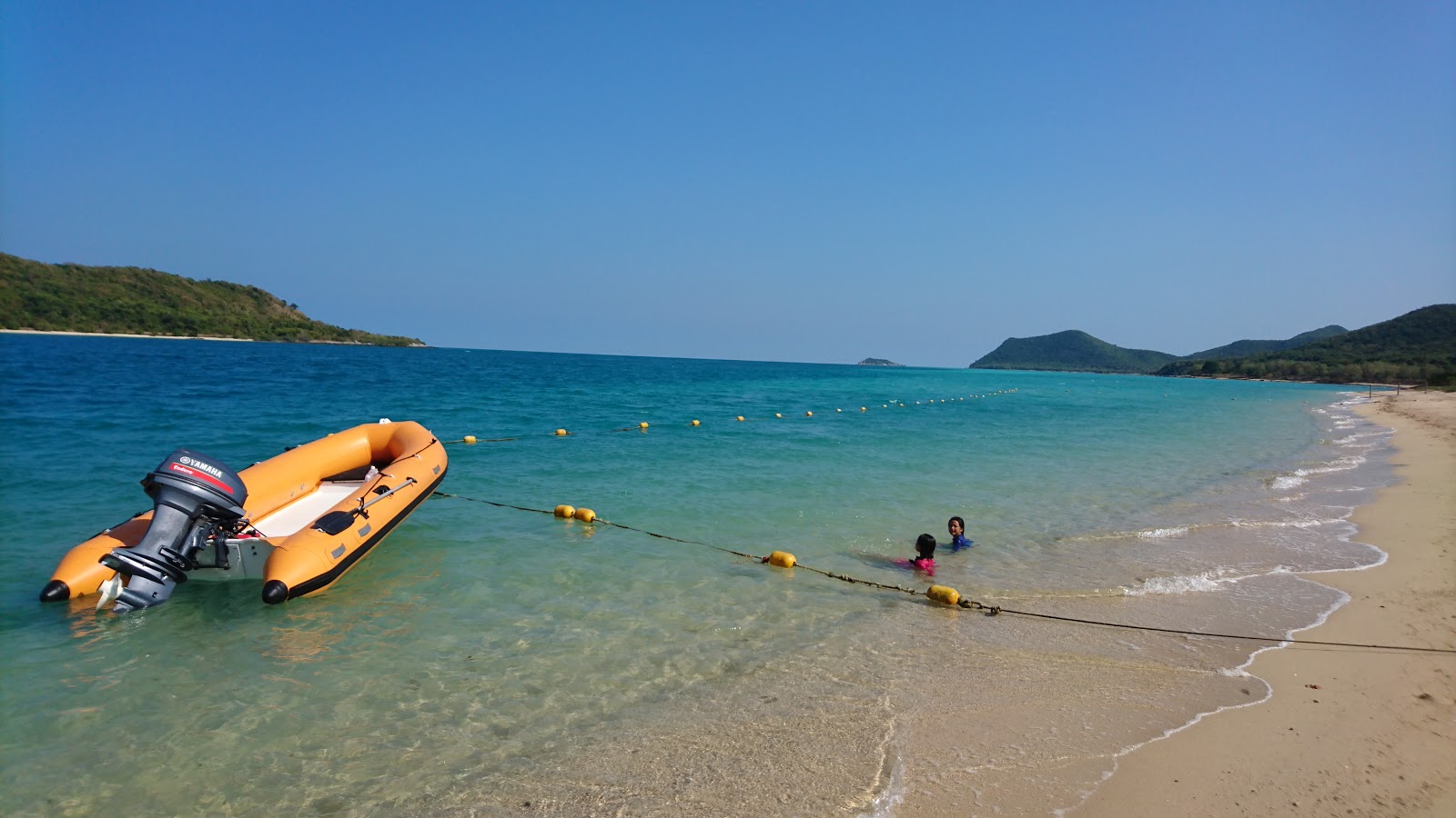 Photo de Tian Beach avec plage spacieuse