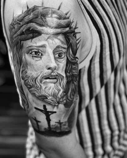 Explore crocodile tattoo ideas, creative tattoo ideas in Norcross, available at Brotherhood Tattoo