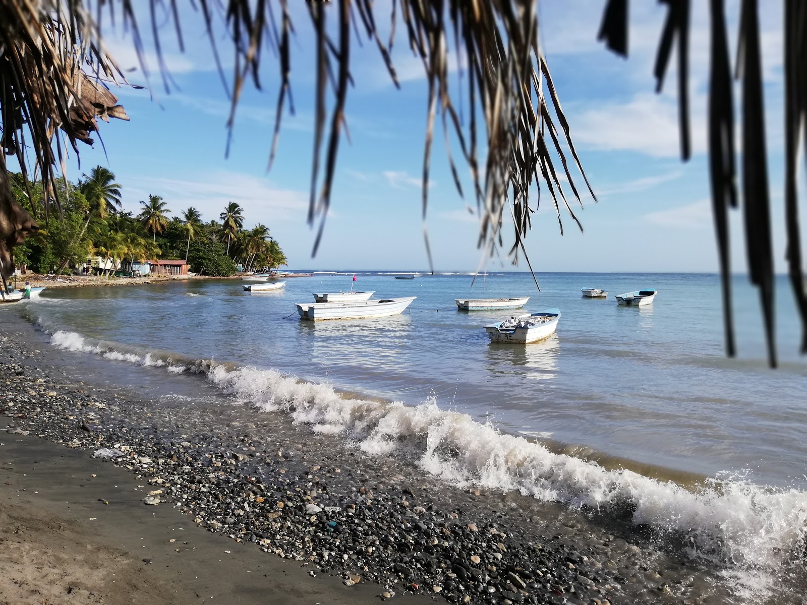 Valokuva Cocoland beachista. puhtaustasolla keskipitkä