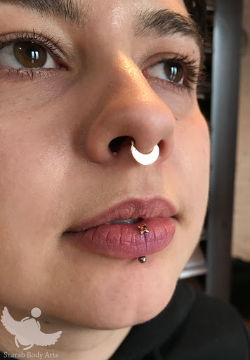 Explore invincible tattoo ideas, creative tattoo ideas in Syracuse, available at Scarab Body Arts