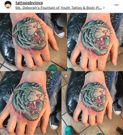 Explore fist tattoo ideas, creative tattoo ideas in Saint Augustine, available at Ms. Deborahs Fountain of Youth Tattoo & Body Piercing
