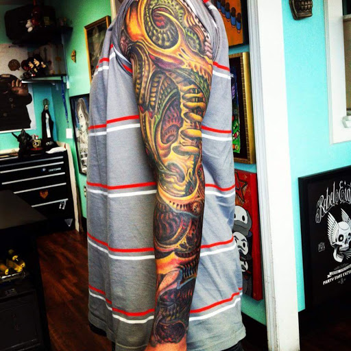 Explore dog memorial tattoo ideas, creative tattoo ideas in Reno, available at Evolution Tattoo