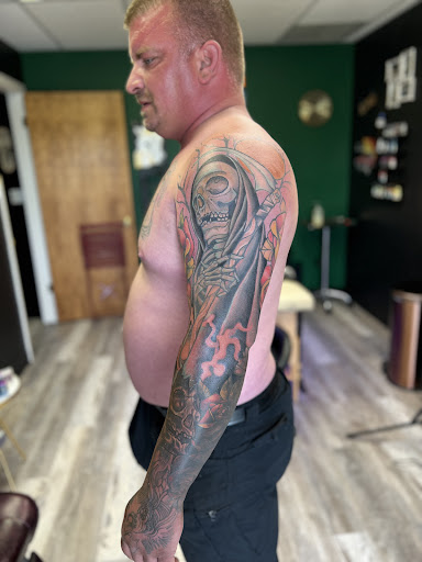 Explore tattoo ideas for men upper arm, creative tattoo ideas in Clearfield, available at Image Injection Tattoo & Piercing studio