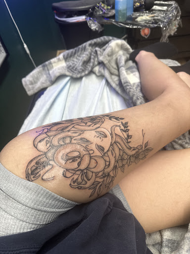 Explore male upper arm tattoo ideas, creative tattoo ideas in Fairfield, available at The Golden Scale Tattoo Co.