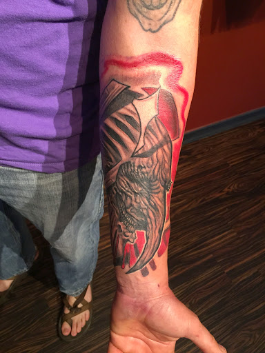 Explore black cat tattoo ideas, creative tattoo ideas in Huntsville, available at Blacktide Tattoo Co.