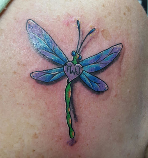 Explore grinch tattoo ideas, creative tattoo ideas in Myrtle Beach, available at Elite Ink Tattoos of Myrtle Beach