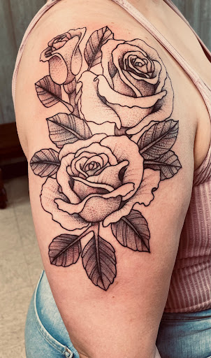 Explore four leaf clover tattoo ideas, creative tattoo ideas in Elkin, available at Black Bear Tattoo